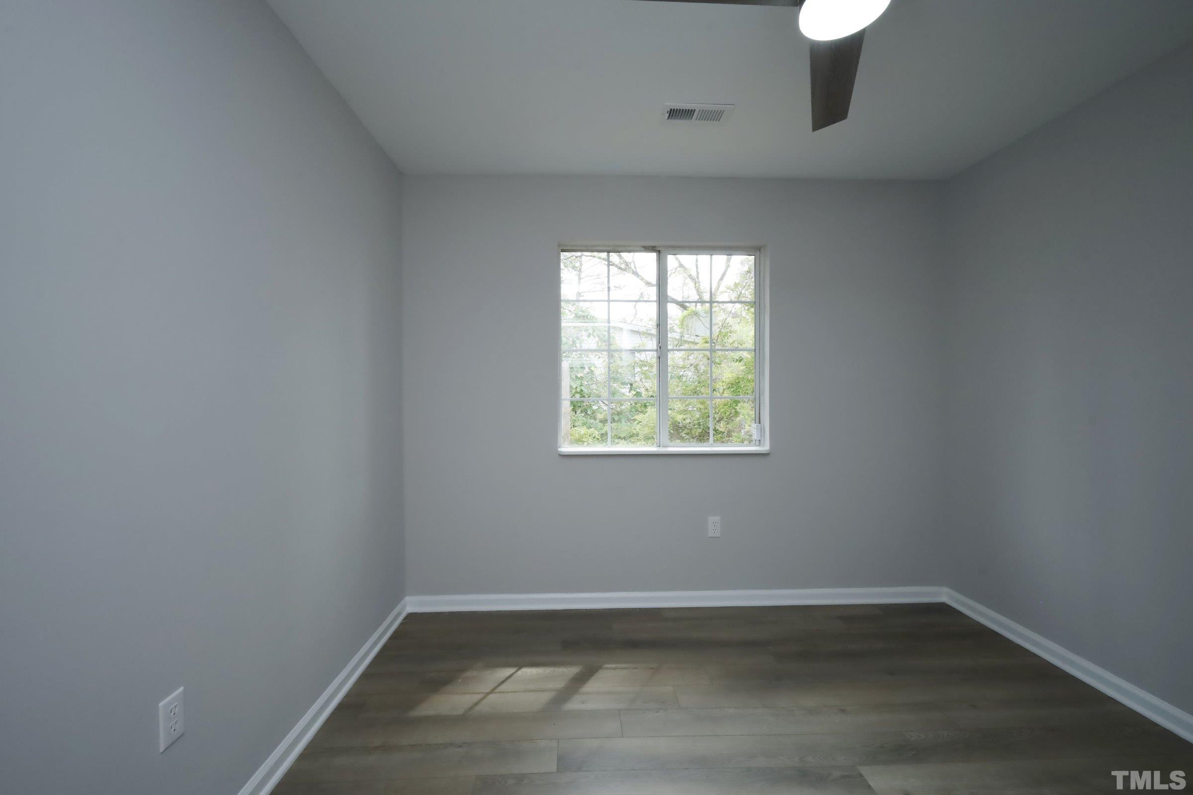 100 Mitchener Street Garner, NC 27529 - Photo 19 of 37 an empty room with a window