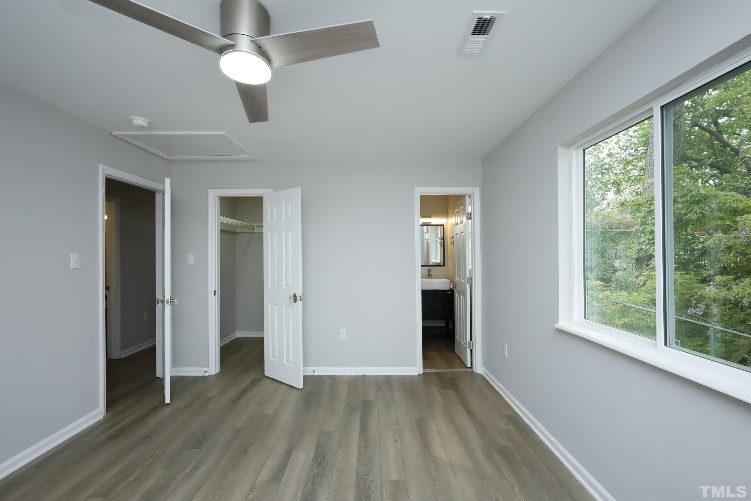 100 Mitchener Street Garner, NC 27529 - Photo 23 of 37 wooden floor in an empty room with a window