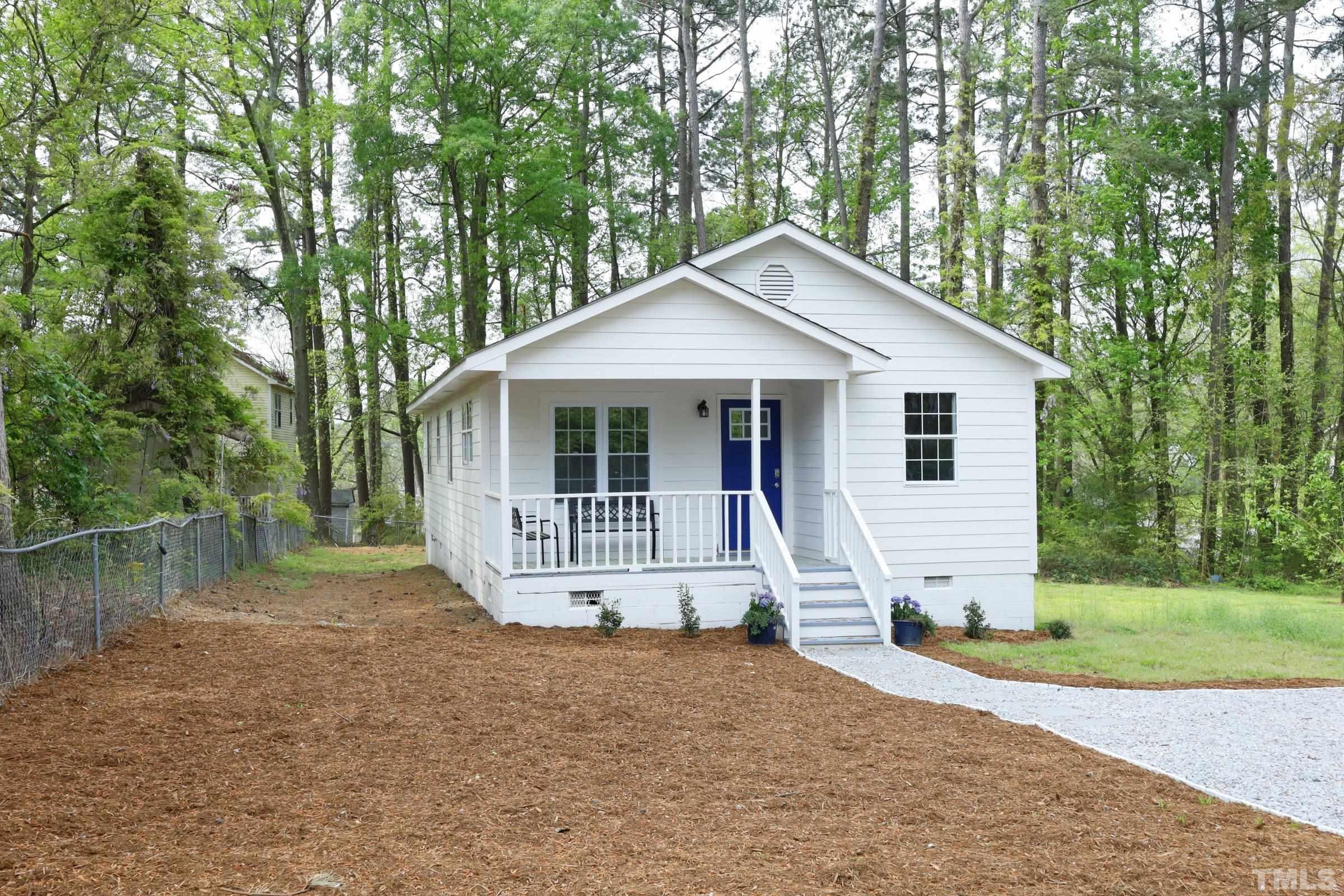 100 Mitchener Street Garner, NC 27529 - Photo 3 of 37 a view of a house with a yard