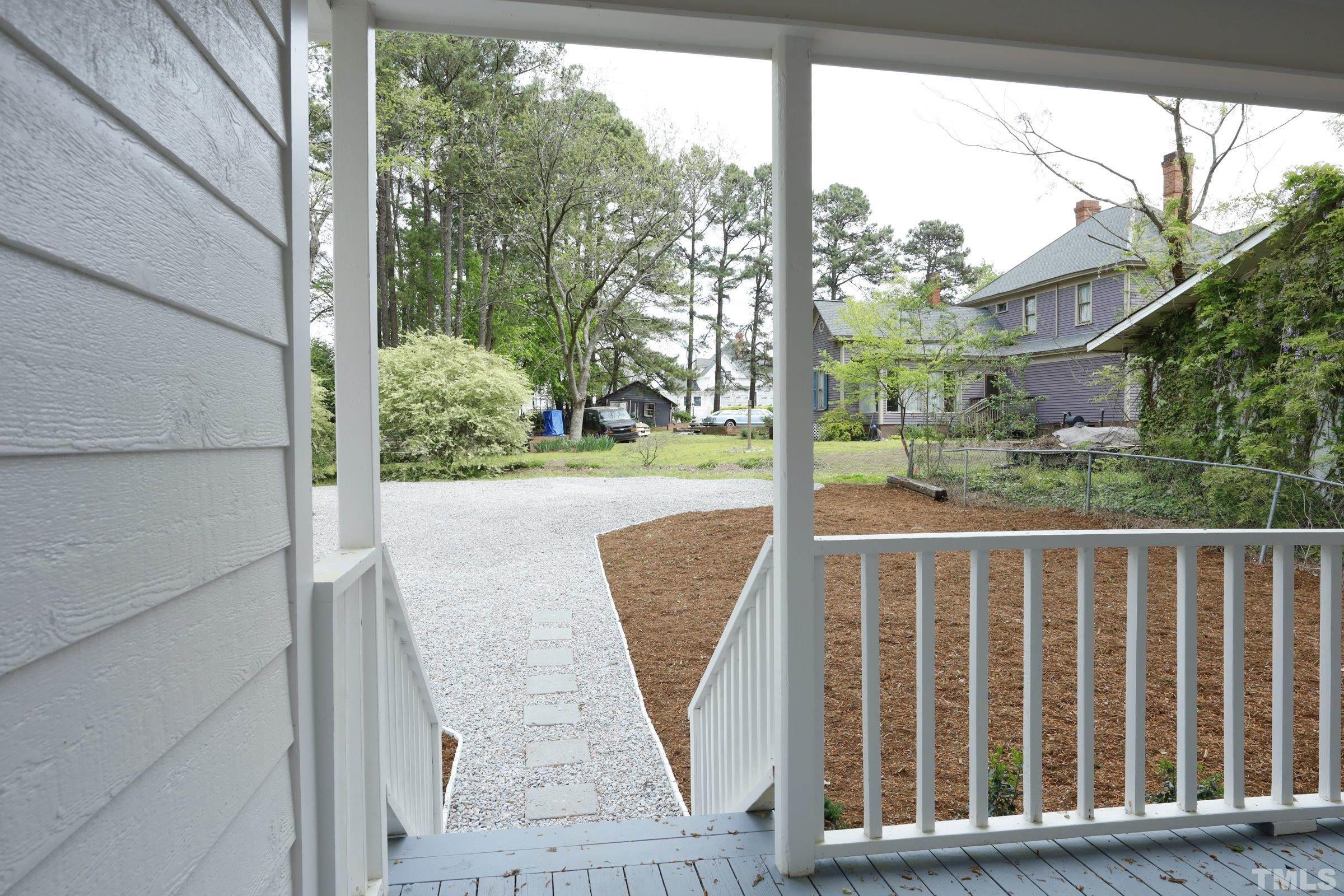100 Mitchener Street Garner, NC 27529 - Photo 31 of 37 a view of a chair and tables in the balcony
