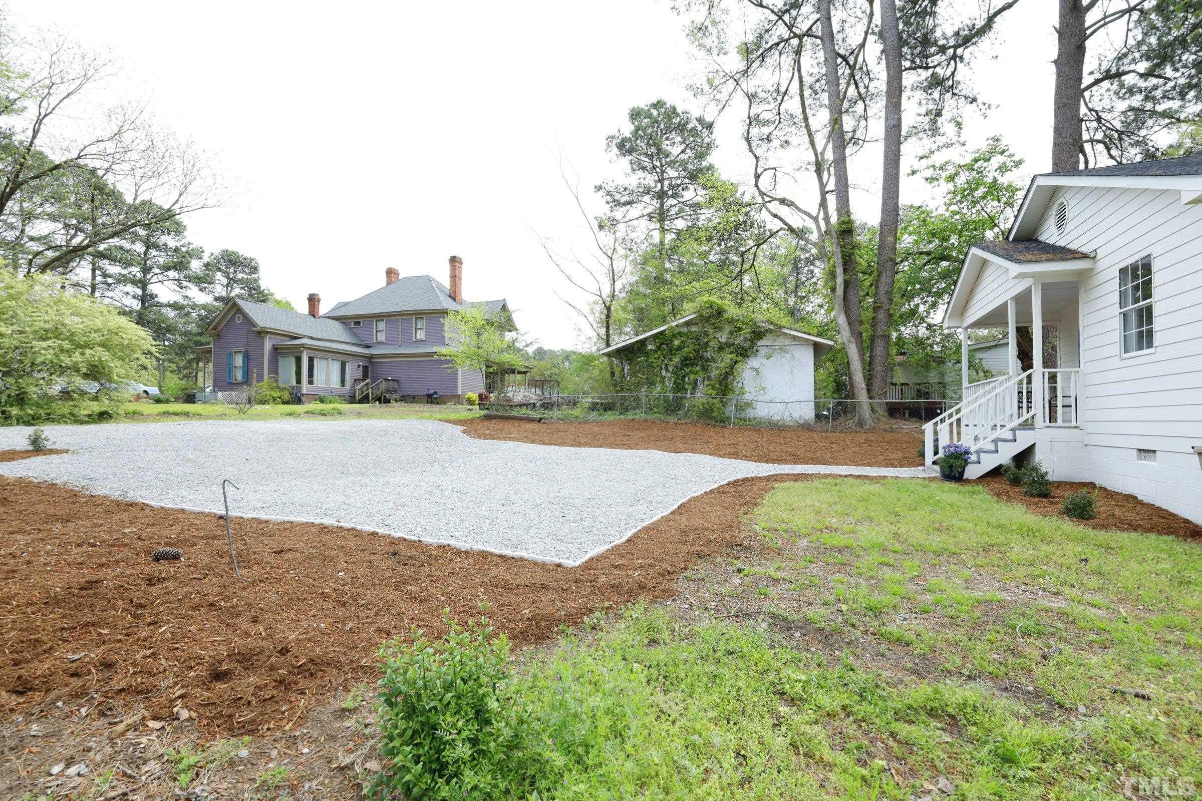 100 Mitchener Street Garner, NC 27529 - Photo 32 of 37 a view of road with large trees