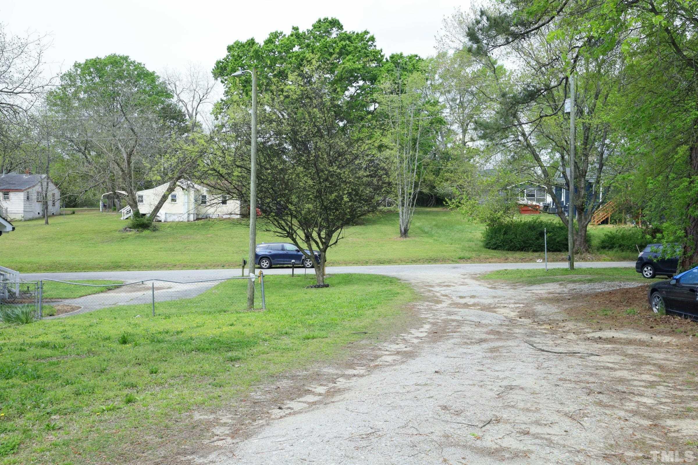 100 Mitchener Street Garner, NC 27529 - Photo 33 of 37 a view of a park with large trees