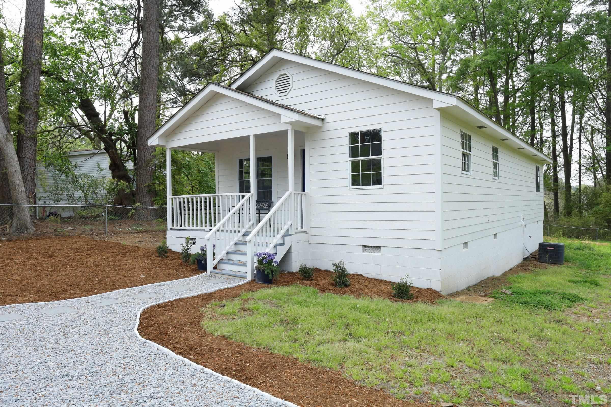 100 Mitchener Street Garner, NC 27529 - Photo 34 of 37 a view of a house with backyard