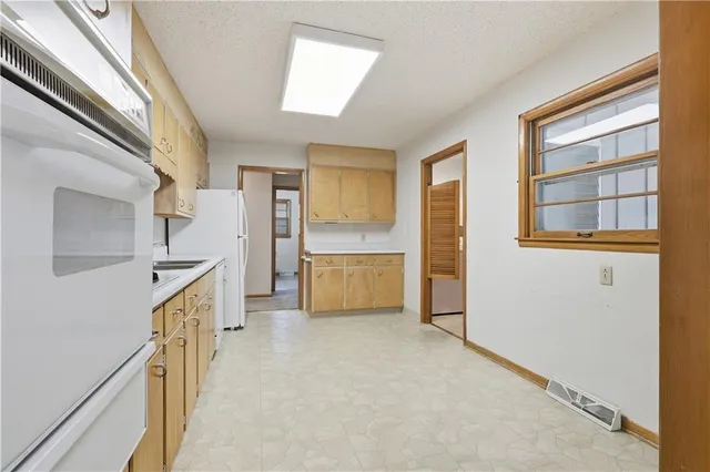 $378,000 | 610 North Shore Drive, Lake Waukomis, MO 64151