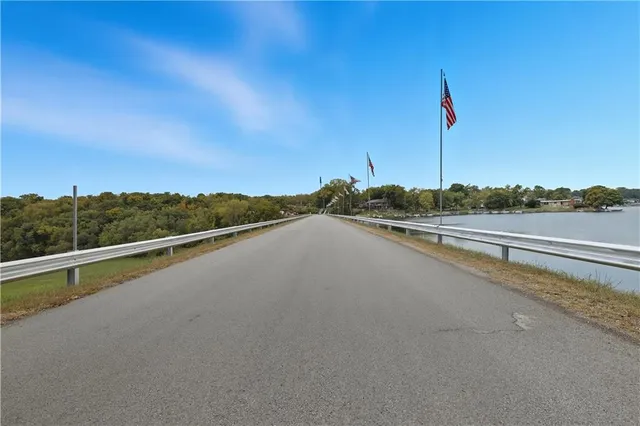 $378,000 | 610 North Shore Drive, Lake Waukomis, MO 64151