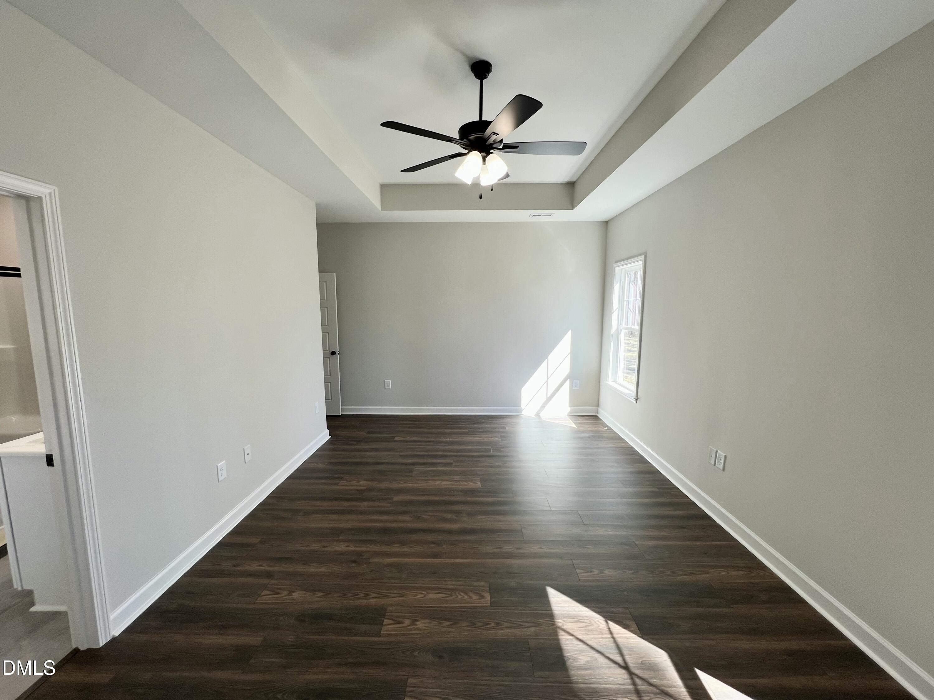 1787 Walnut Run Drive Deep Run, NC 28525 - Photo 10 of 23 a view of a hallway with wooden floor