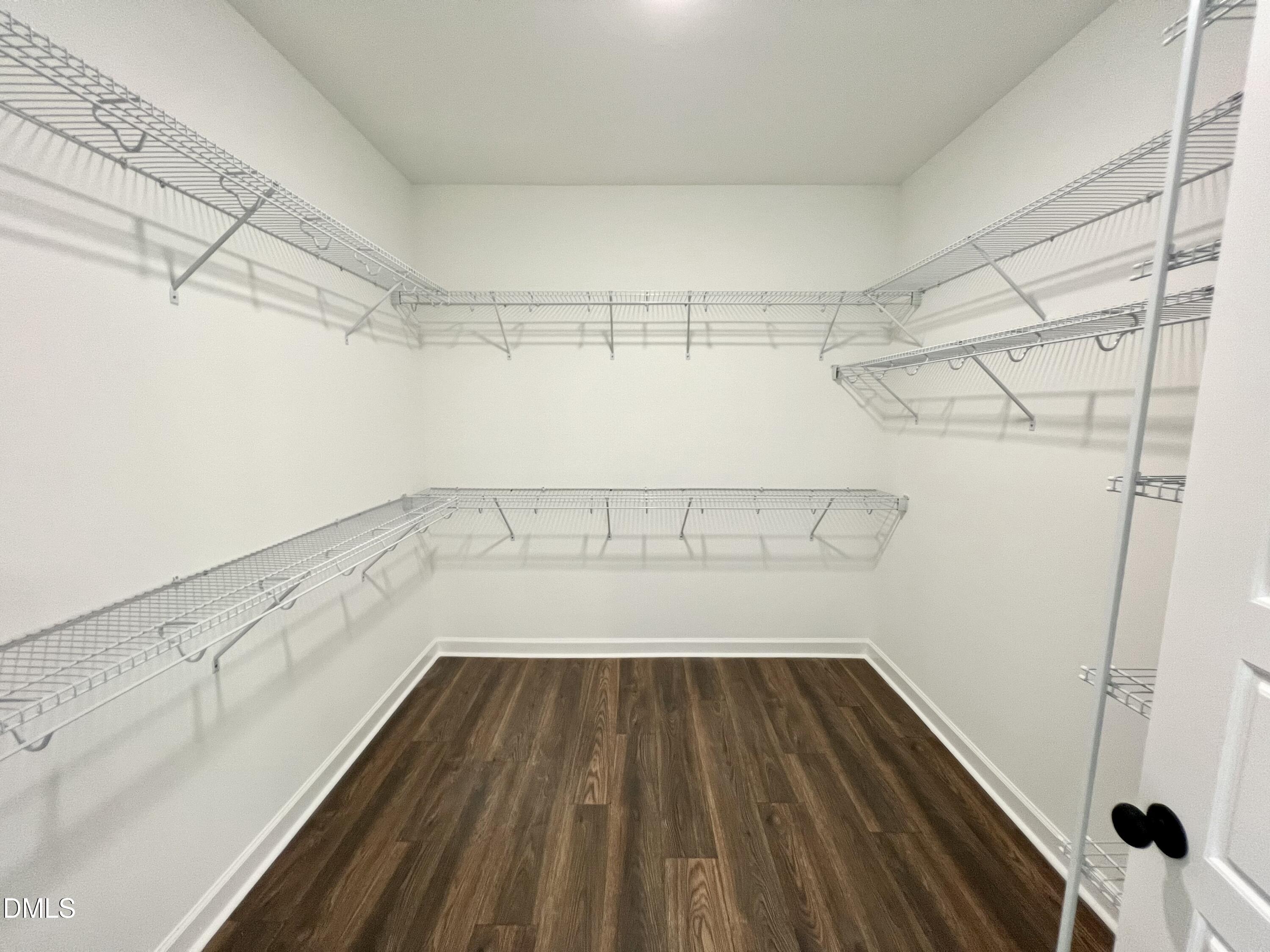 1787 Walnut Run Drive Deep Run, NC 28525 - Photo 13 of 23 a view of a room with racks on the wall