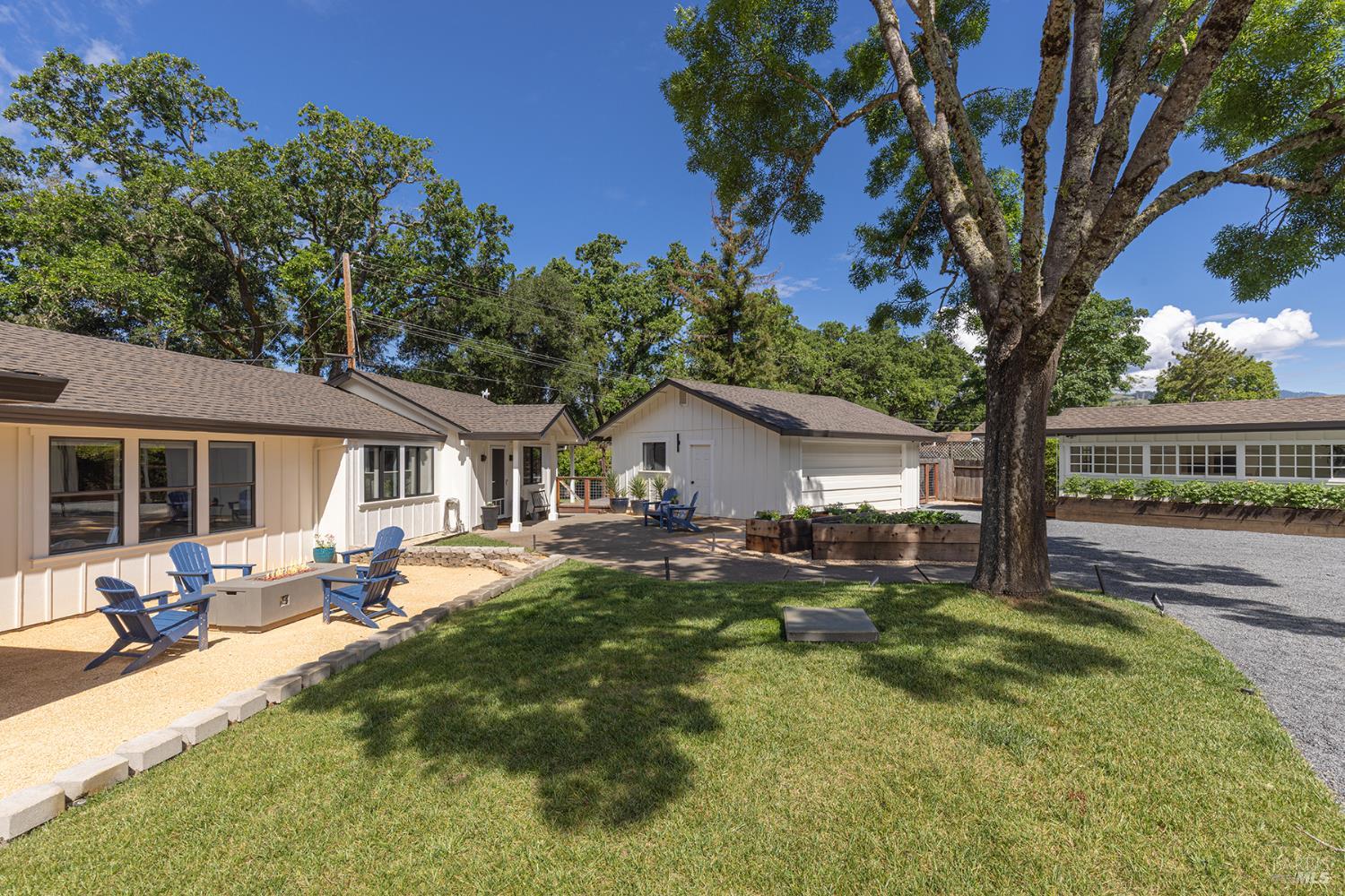 14734 Young Road Healdsburg, CA 95448 - Photo 6 of 47 a front view of house with yard and outdoor seating