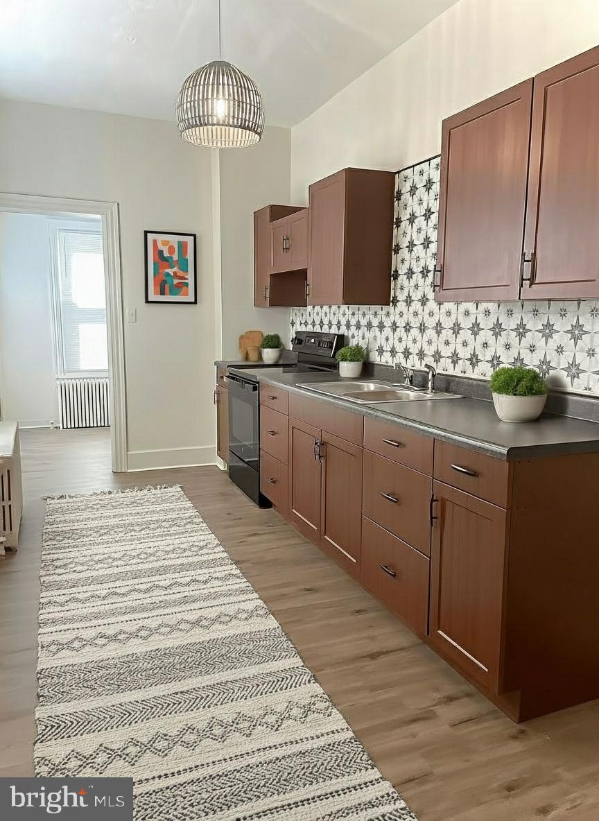 a spacious bathroom with a sink and a mirror