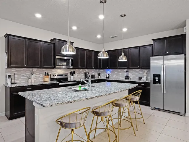 a view of a room with gym equipment and a large window