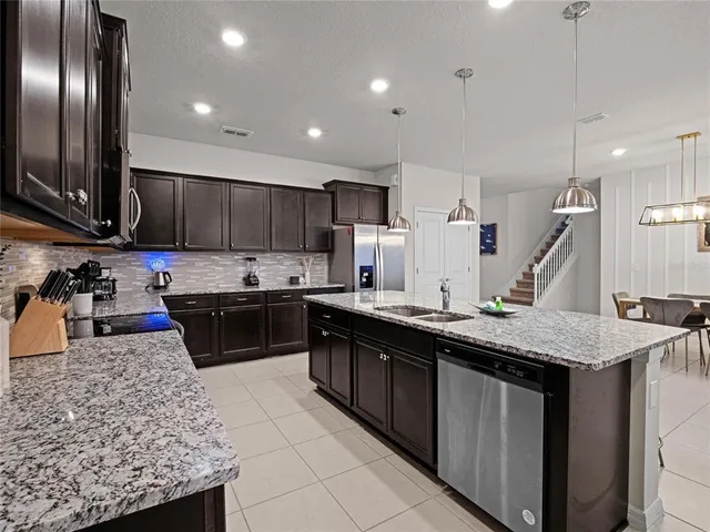 a room with furniture and screen