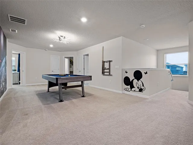 a bathroom with a sink a vanity and a mirror