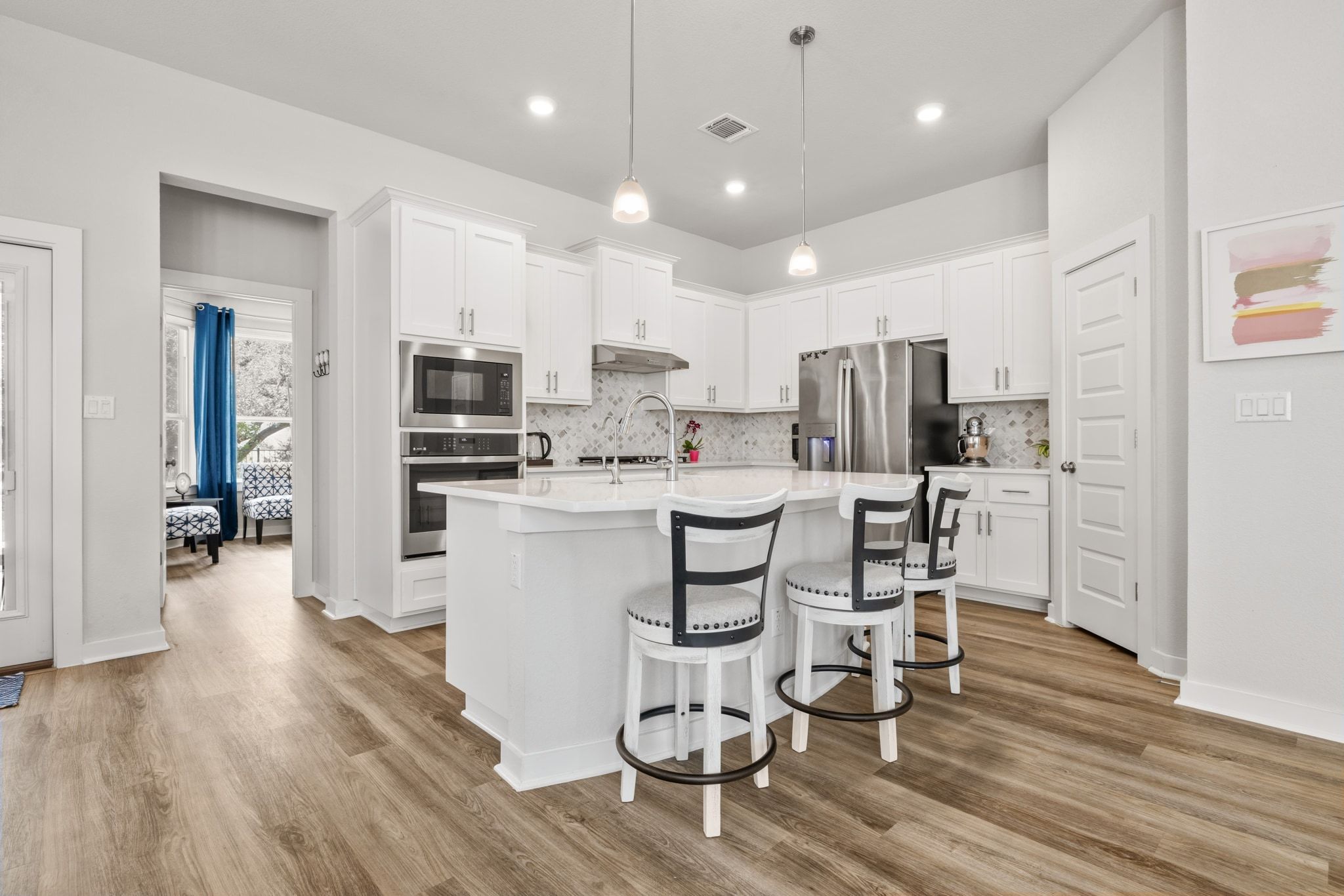 1006 Summer Glen Georgetown, TX 78628 - Photo 16 of 40 A large central island provides a dedicated workspace for meal preparation and casual seating