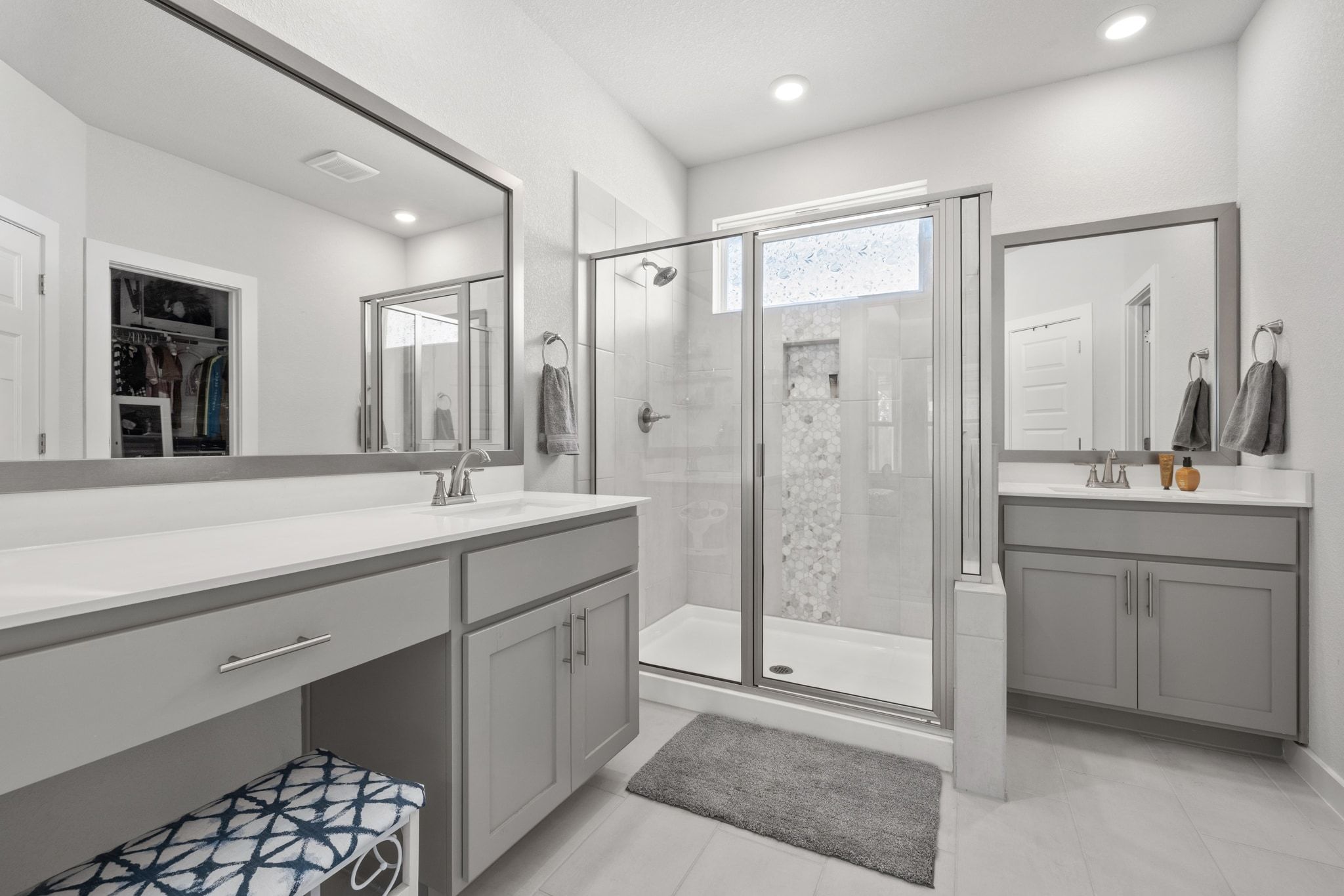 1006 Summer Glen Georgetown, TX 78628 - Photo 23 of 40 The primary ensuite bathroom includes separate vanities with plenty of storage and a large walk-in closet