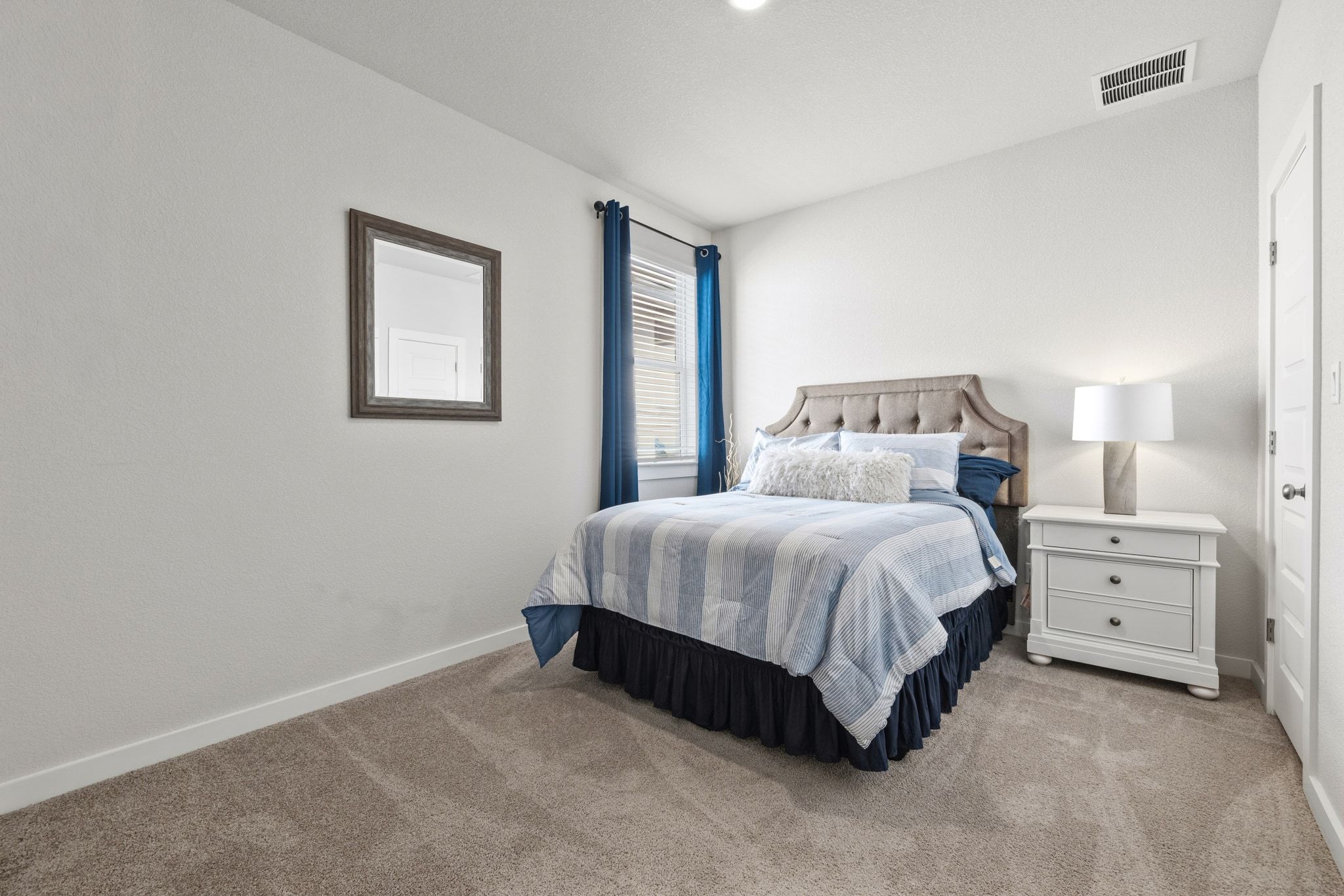 1006 Summer Glen Georgetown, TX 78628 - Photo 25 of 40 Both guest bedrooms include neutral walls and large closets, providing plenty of space for visitors