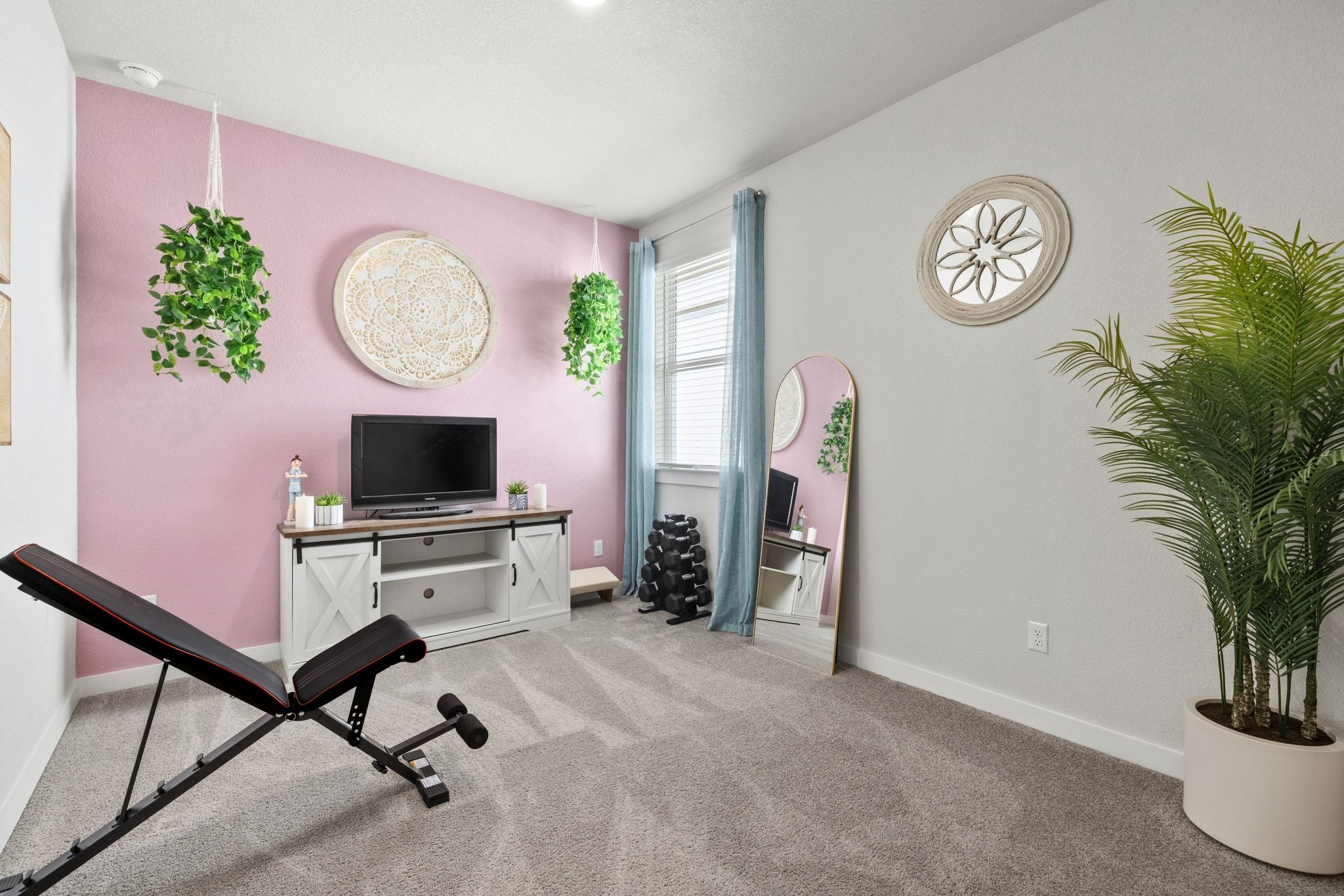 1006 Summer Glen Georgetown, TX 78628 - Photo 27 of 40 High ceilings and large windows continue into the guest rooms, which are separated from the primary suite for added privacy