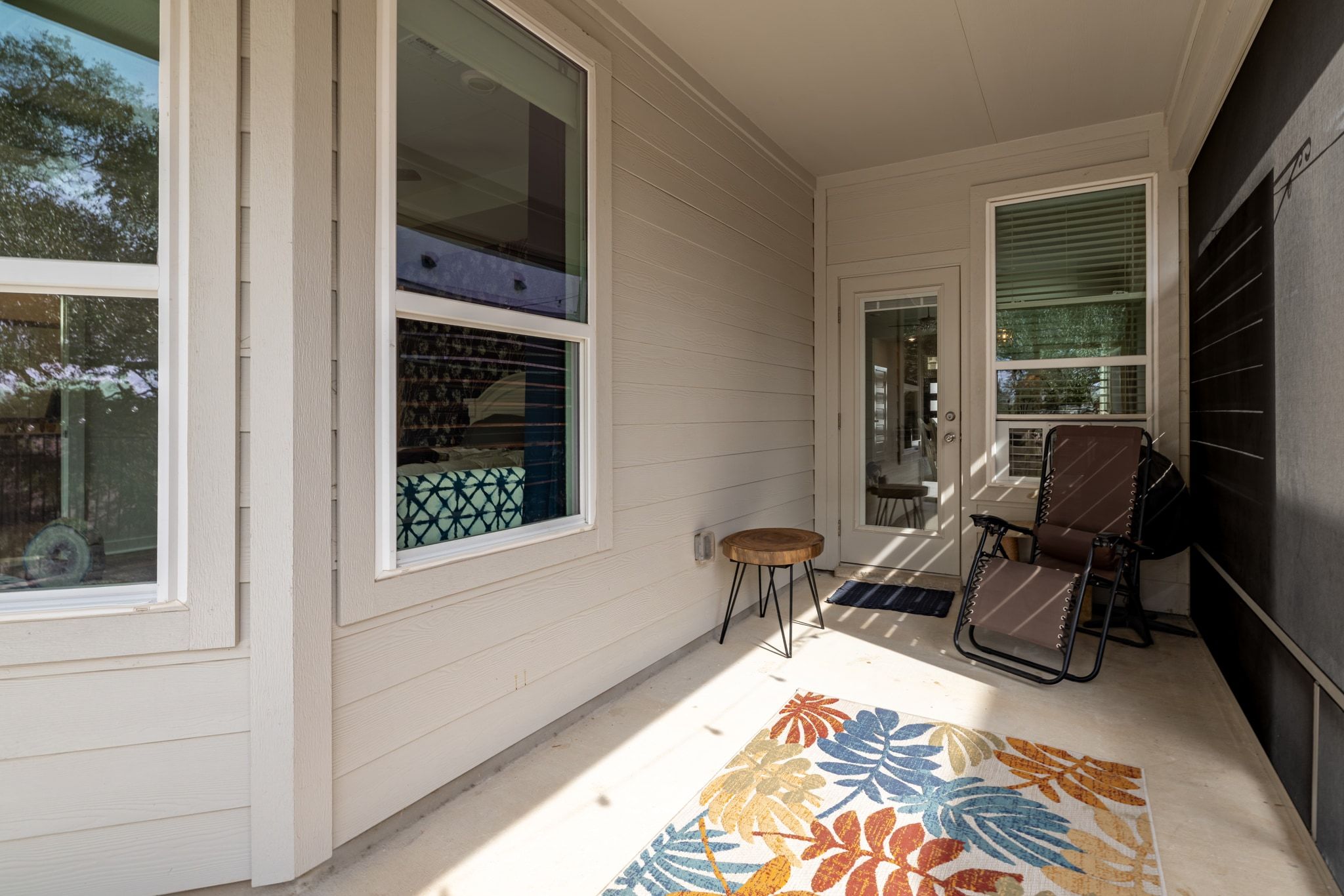 1006 Summer Glen Georgetown, TX 78628 - Photo 29 of 40 The screened-in back patio provides a shaded, protected space to sit and enjoy the quiet view of the greenbelt