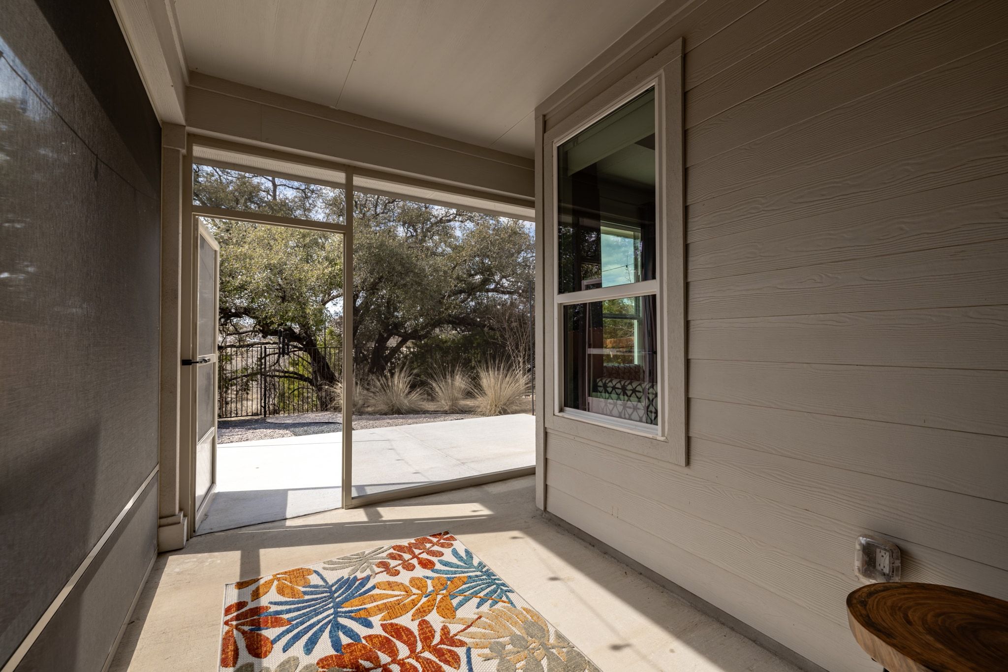 1006 Summer Glen Georgetown, TX 78628 - Photo 30 of 40 With a direct connection to the main living area, the screened-in patio acts as a second dining or lounge spot
