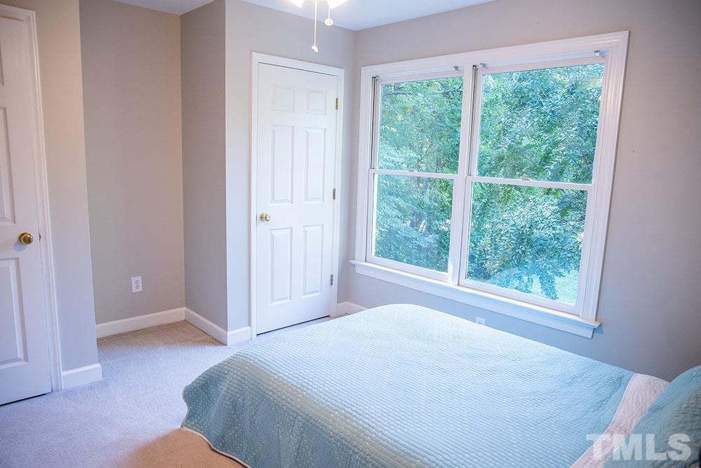 150 Shannon Road Timberlake, NC 27583 - Photo 23 of 30 a bedroom with a bed and a window