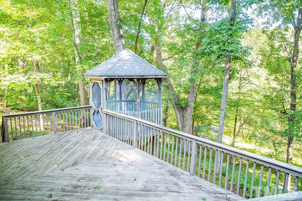 150 Shannon Road Timberlake, NC 27583 - Photo 25 of 30 a view of a wooden deck