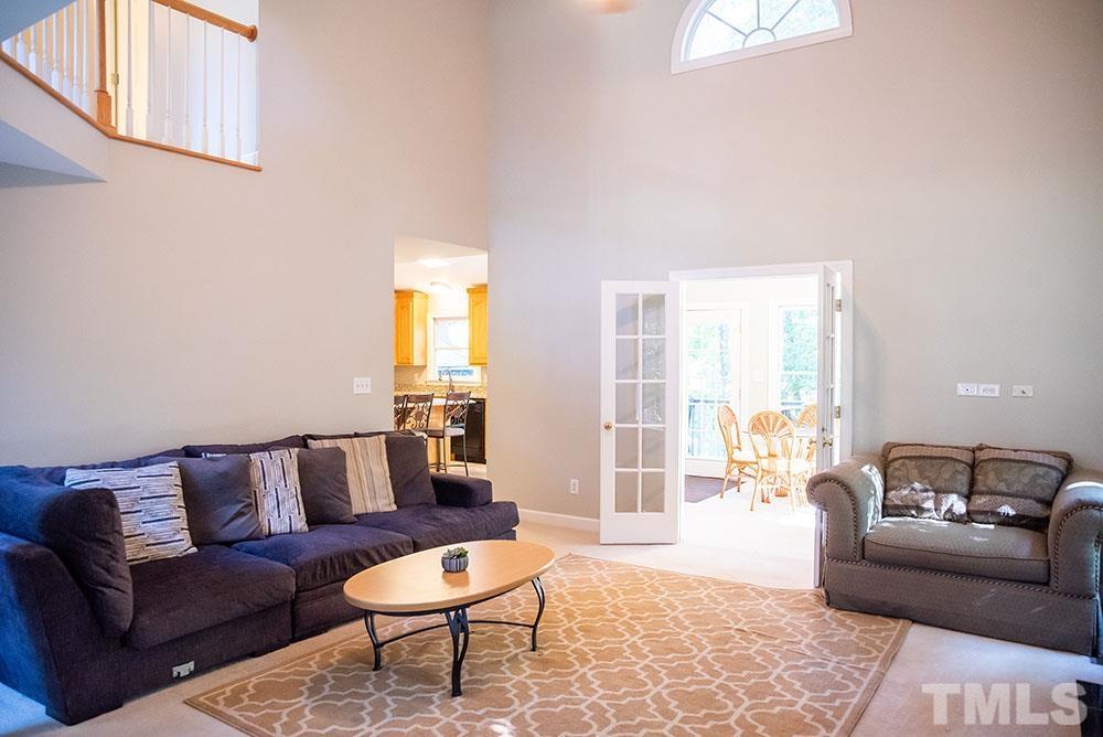150 Shannon Road Timberlake, NC 27583 - Photo 8 of 30 a living room with furniture and a couch