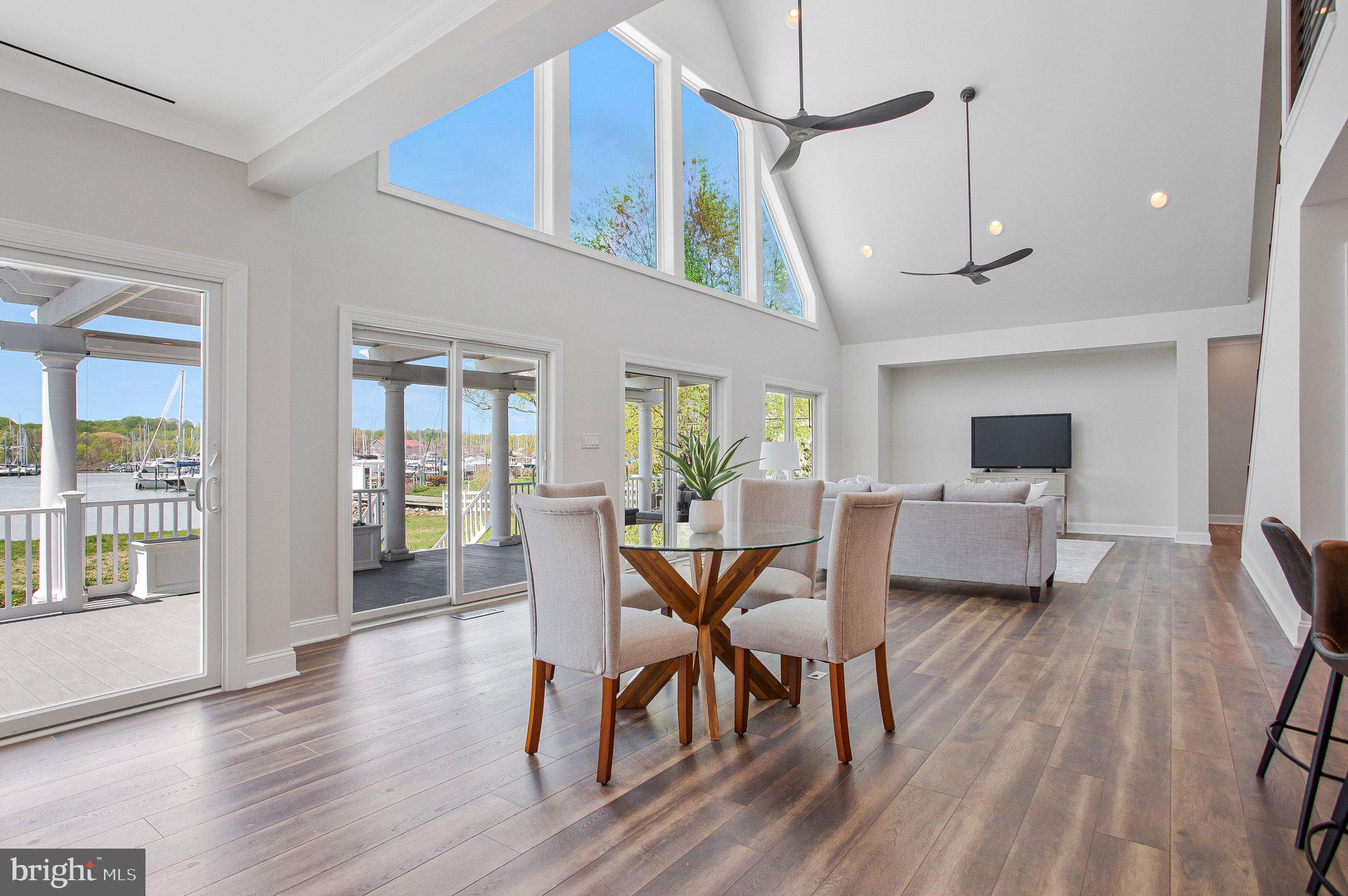 6146 Drum Point Road Deale, MD 20751 - Photo 75 of 75 a view of a dining room with furniture and wooden floor