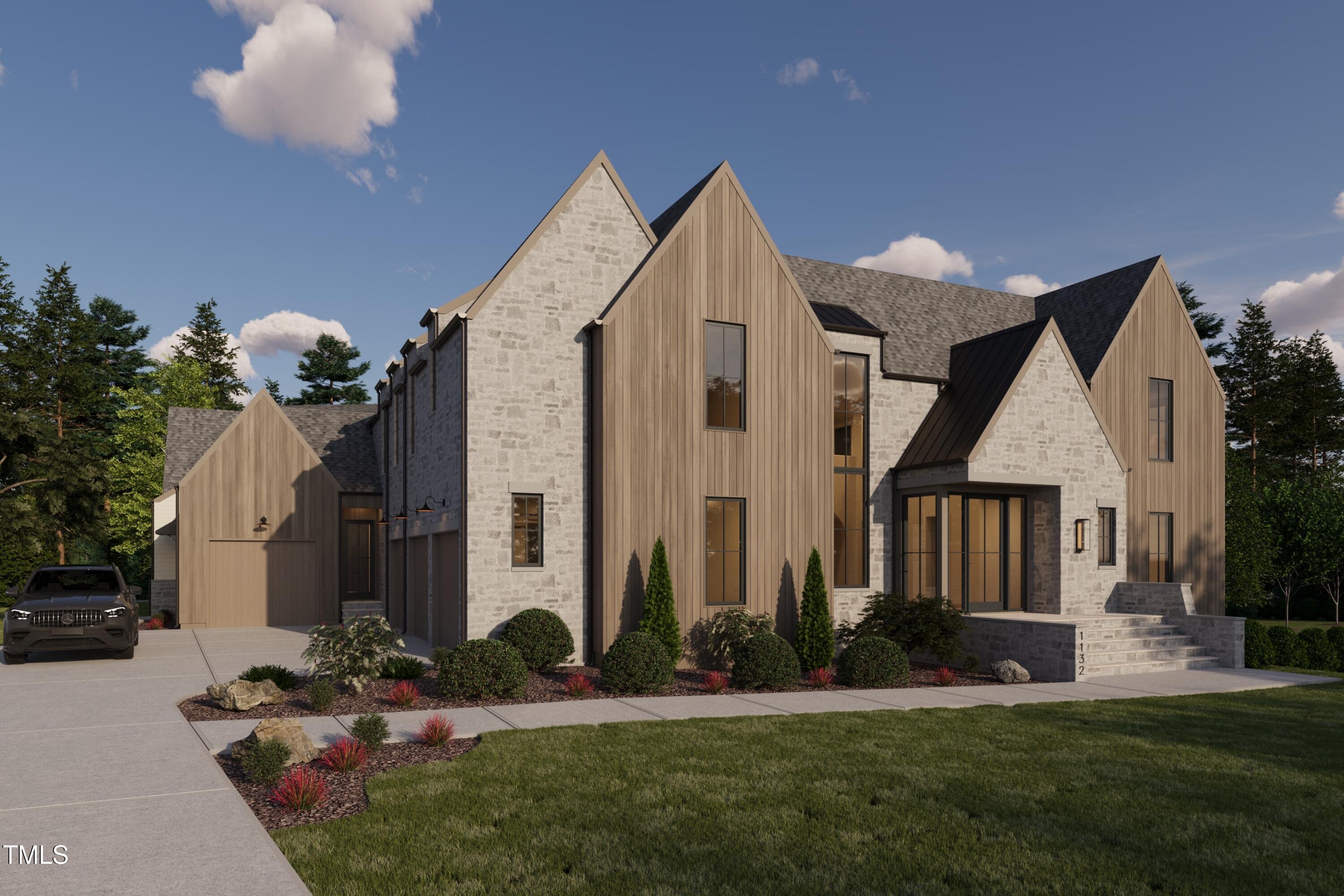 1132 Wimbleton Drive Raleigh, NC 27609 - Photo 1 of 30 a front view of a house with a yard