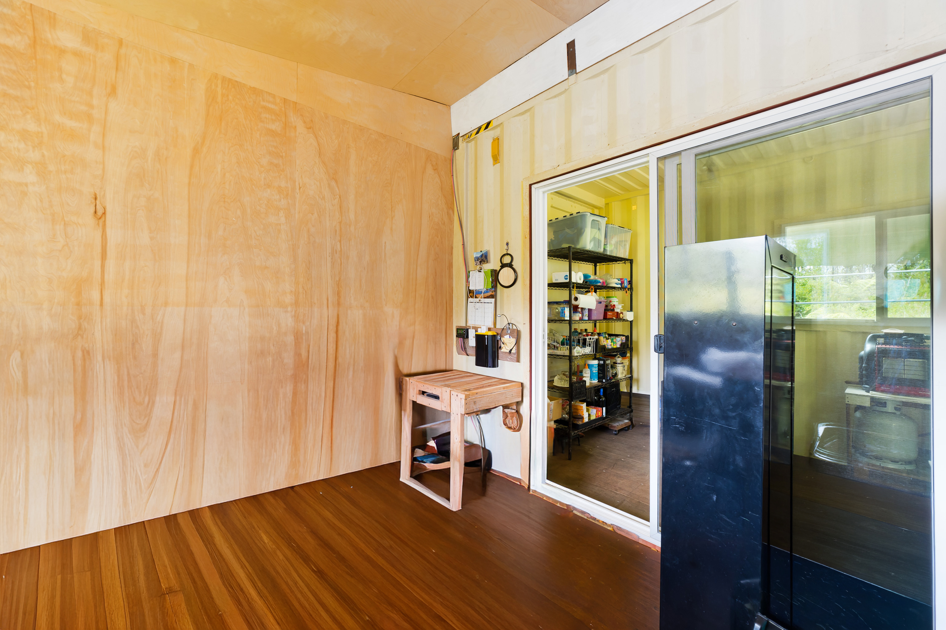 11-2430 Makoa Road Mountain View, HI 96771 - Photo 12 of 30 a porch with a table and chairs