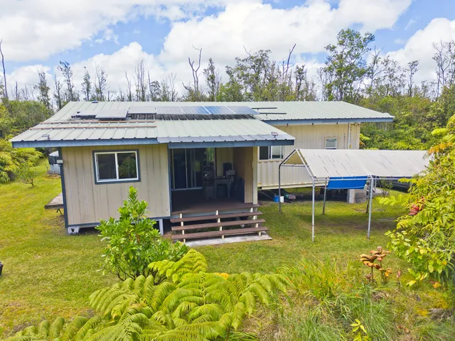 a view of a house with pool porch and furniture