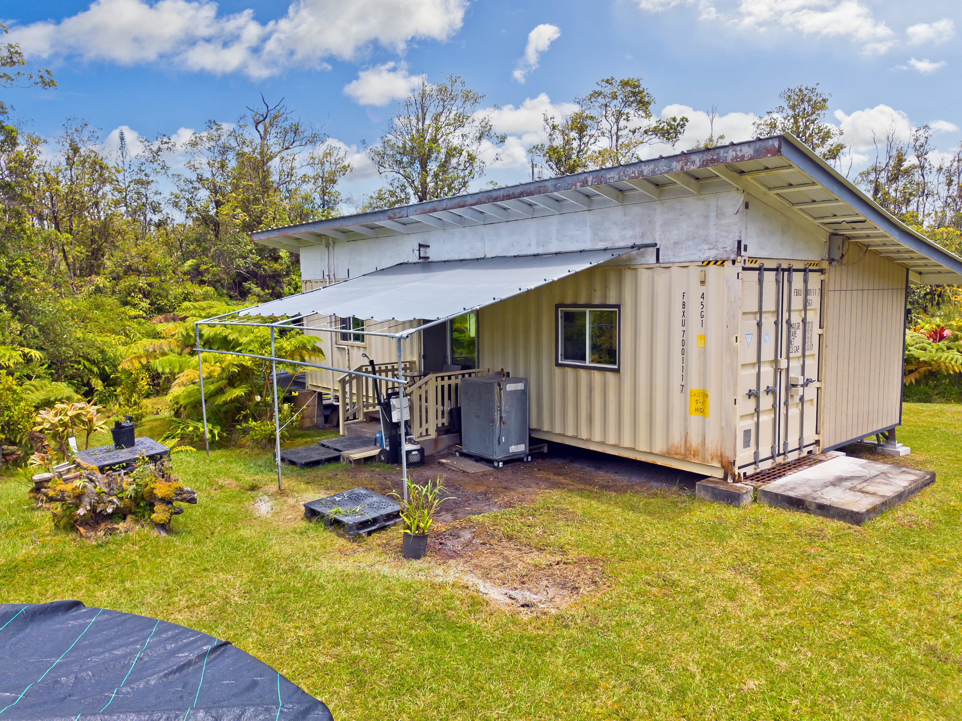 11-2430 Makoa Road Mountain View, HI 96771 - Photo 20 of 30 a view of a backyard with a patio