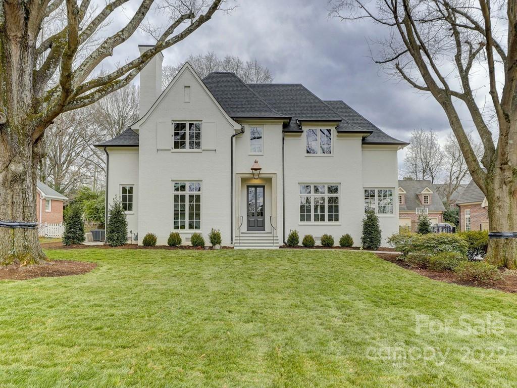 1429 Audubon Road Charlotte, NC 28211 - Photo 1 of 48 a front view of a house with a yard