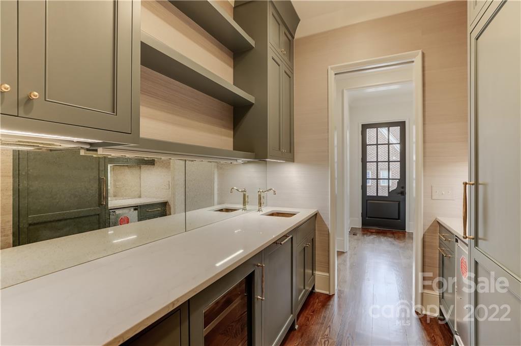 1429 Audubon Road Charlotte, NC 28211 - Photo 11 of 48 a kitchen with a sink and cabinets