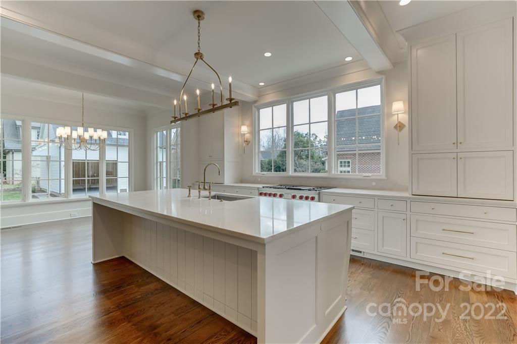 1429 Audubon Road Charlotte, NC 28211 - Photo 15 of 48 a large white kitchen with a large window