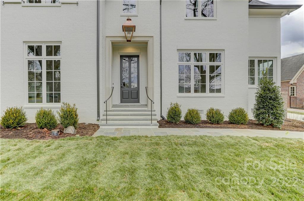 1429 Audubon Road Charlotte, NC 28211 - Photo 2 of 48 a front view of a house with a yard