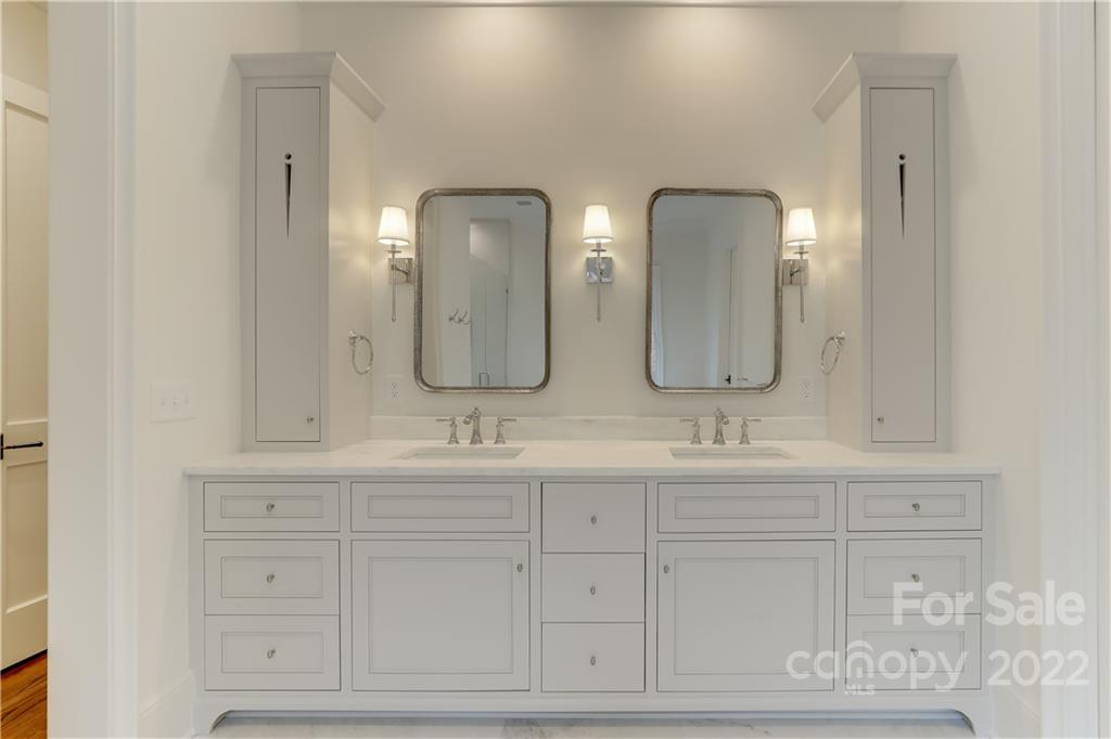 1429 Audubon Road Charlotte, NC 28211 - Photo 24 of 48 a bathroom with double vanity sinks and a mirror