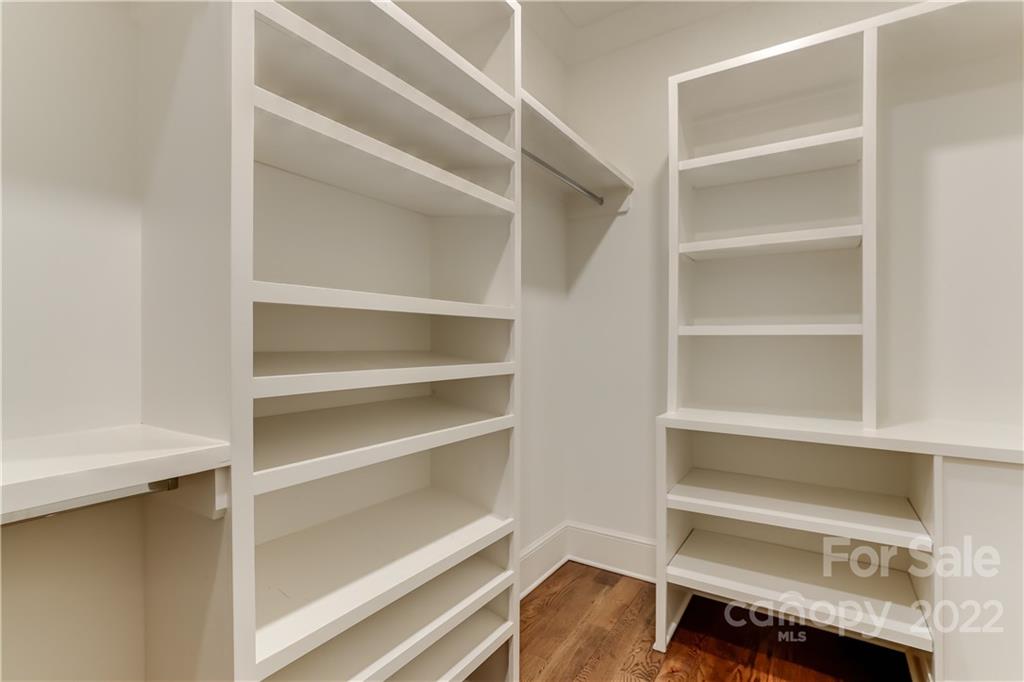 1429 Audubon Road Charlotte, NC 28211 - Photo 26 of 48 a view of walk in closet with empty racks