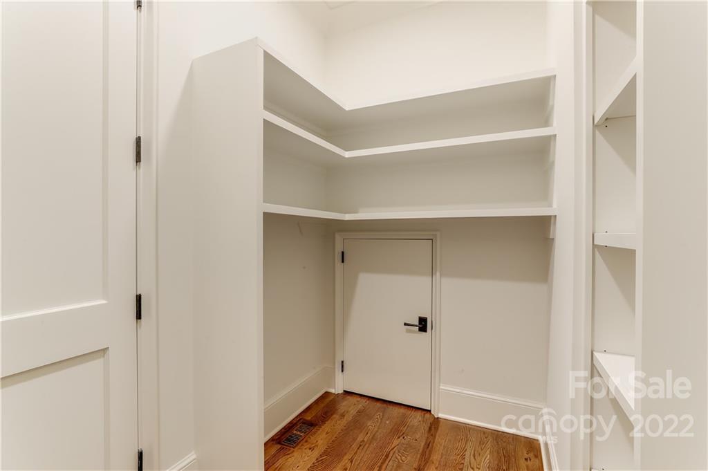 1429 Audubon Road Charlotte, NC 28211 - Photo 27 of 48 a view of walk in closet with empty racks