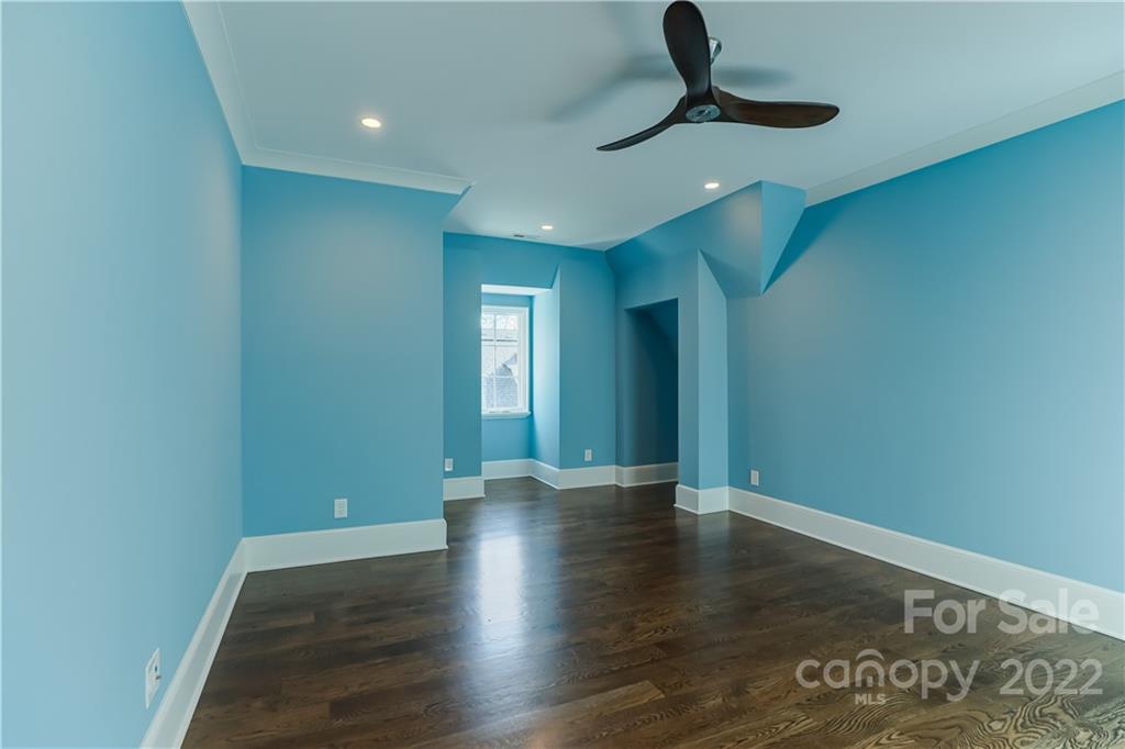 1429 Audubon Road Charlotte, NC 28211 - Photo 34 of 48 a view of an empty room with wooden floor