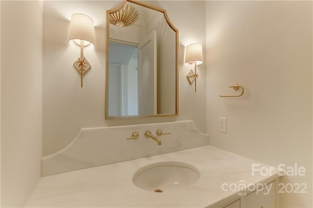 1429 Audubon Road Charlotte, NC 28211 - Photo 10 of 48 a bathroom with a sink and mirror