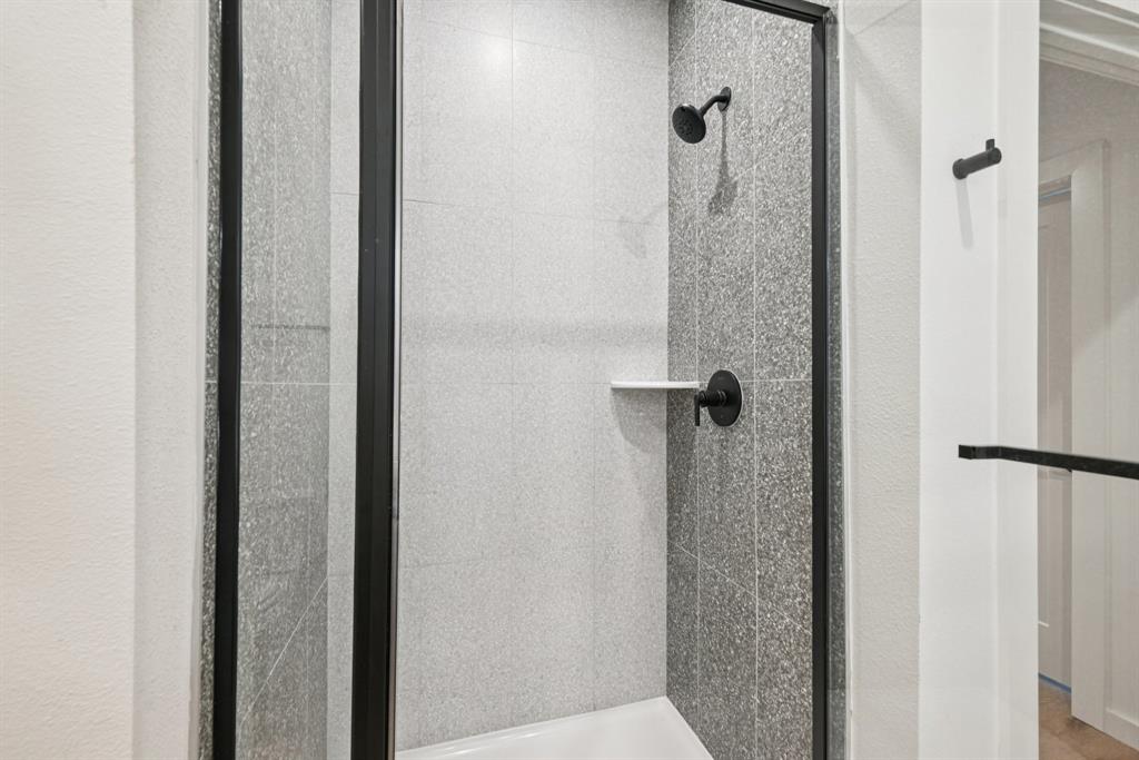 2016 South Ervay Street, Unit A1 Dallas, TX 75215 - Photo 16 of 35 Bathroom view of a stall shower