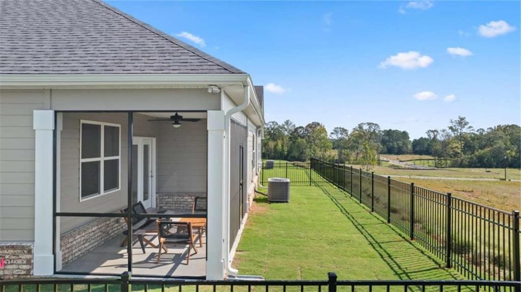 652 Parnassus Road Locust Grove, GA 30248 - Photo 43 of 43 a view of a balcony with yard