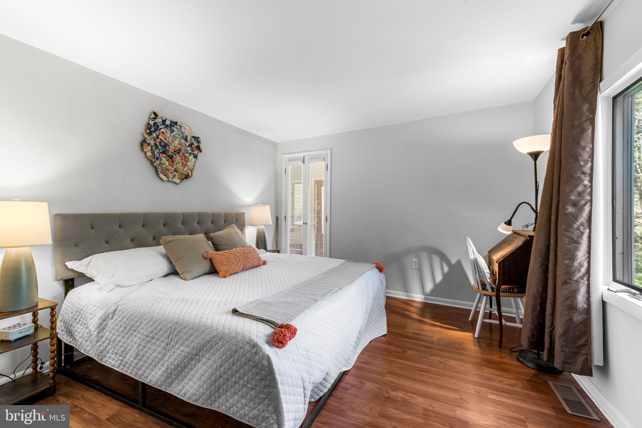 8230 Dogwood Road Windsor Mill, MD 21244 - Photo 21 of 58 Main level Bedroom, or Office-door to Sunporch