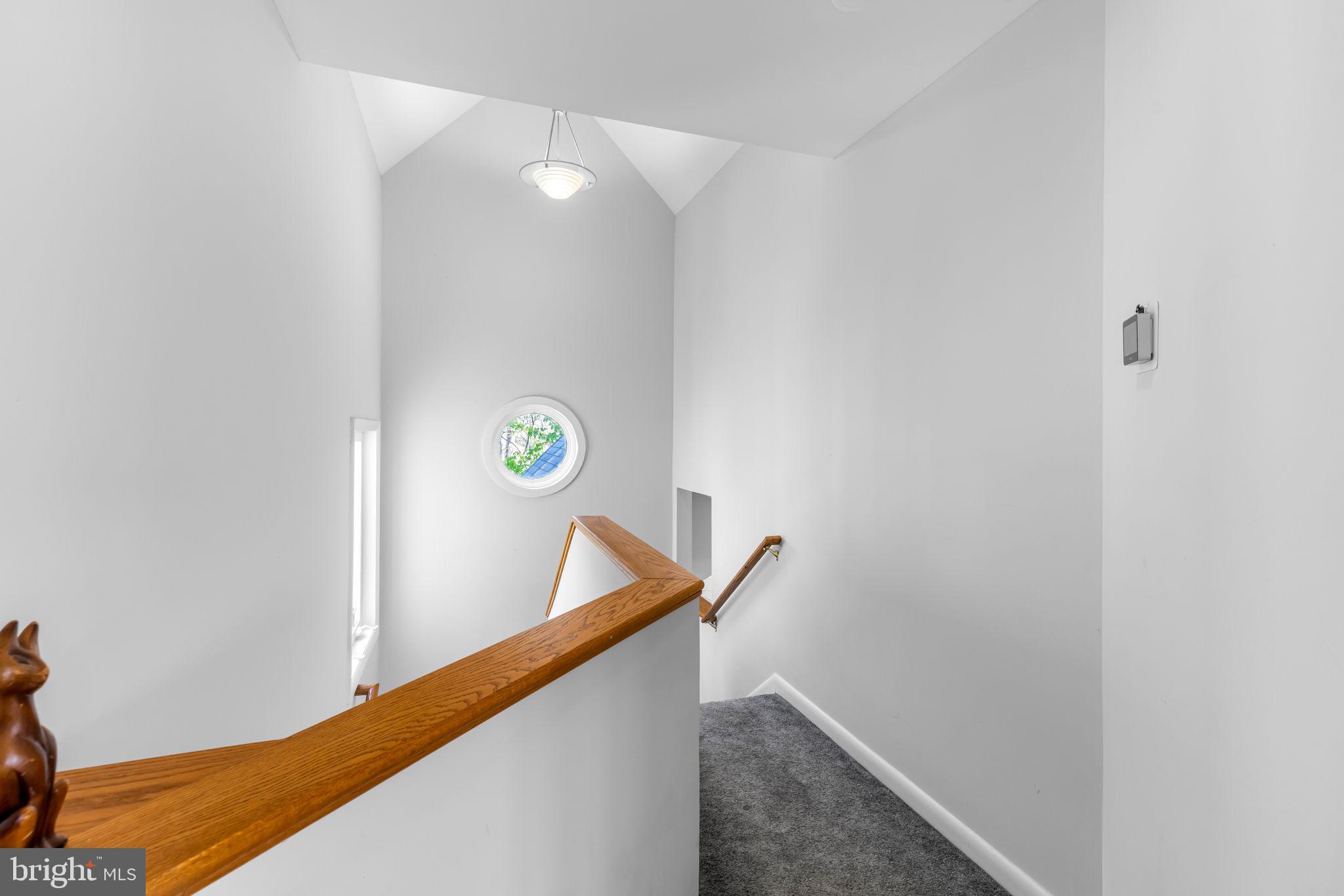 8230 Dogwood Road Windsor Mill, MD 21244 - Photo 24 of 58 2nd floor landing Cathedral Ceiling in stairwell