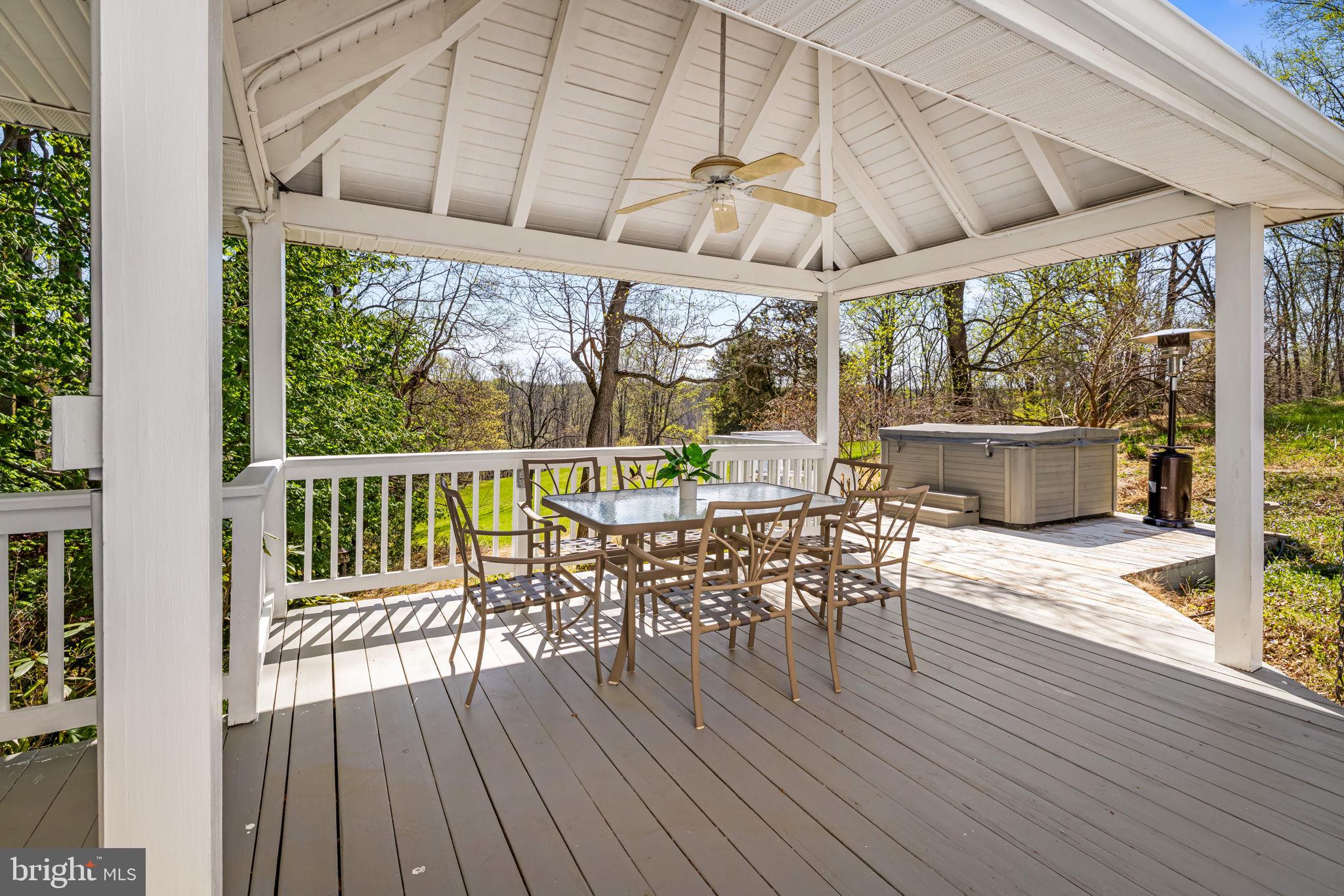 8230 Dogwood Road Windsor Mill, MD 21244 - Photo 40 of 58 Covered Deck off the Dining Room Hot Tub included!