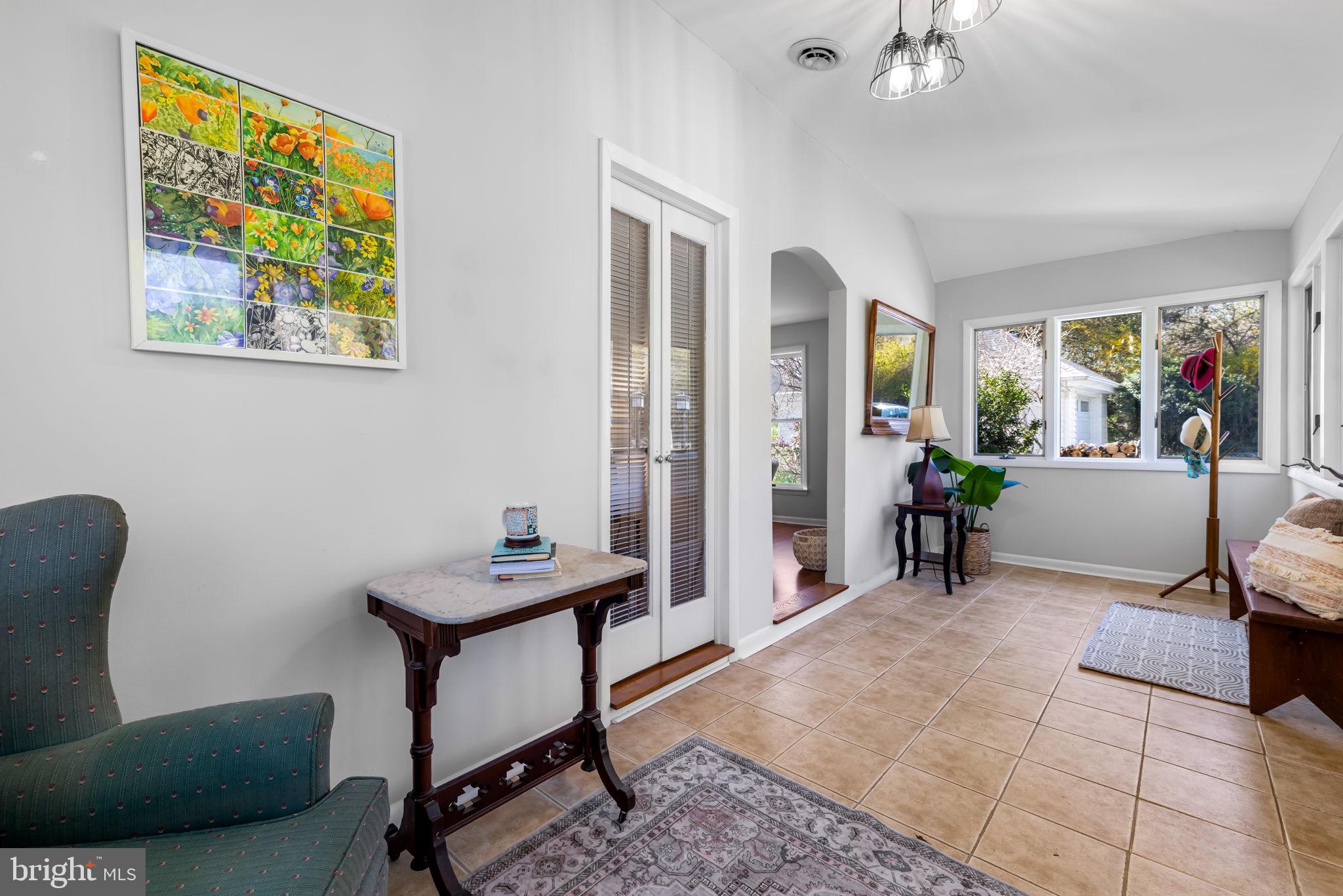 8230 Dogwood Road Windsor Mill, MD 21244 - Photo 5 of 58 Sunroom at the front of the house