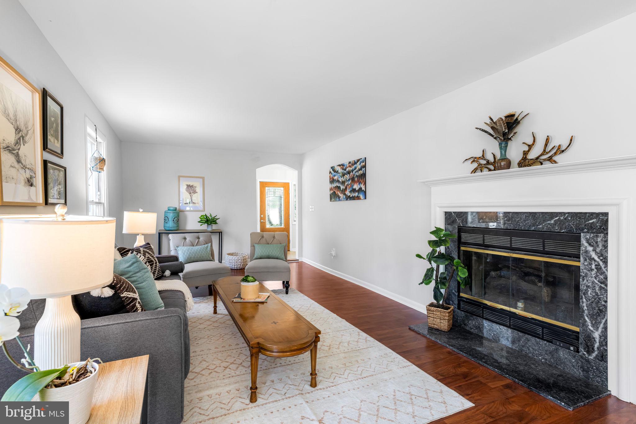 8230 Dogwood Road Windsor Mill, MD 21244 - Photo 7 of 58 Living Room with a propane Fireplace