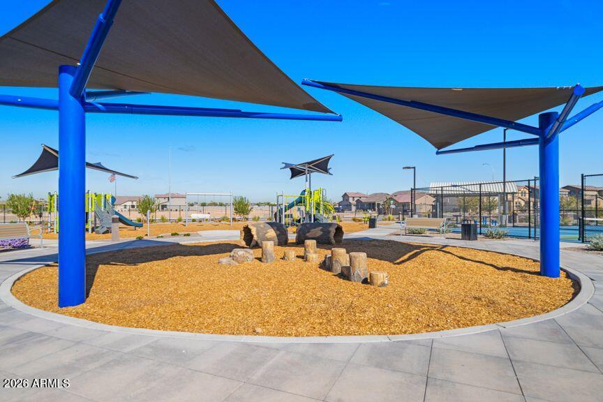 10034 West Piccadilly Road Avondale, AZ 85392 - Photo 11 of 18 a view of a swimming pool with outdoor seating