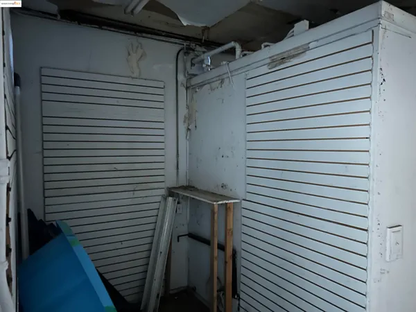 a bathroom with a toilet and a sink