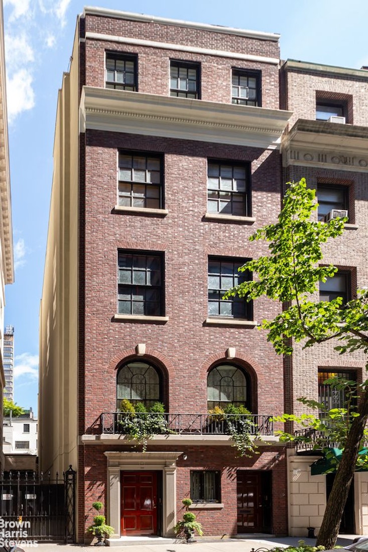 109 East 69th Street Manhattan, NY 10021 - Photo 1 of 9 a front view of a building with plants