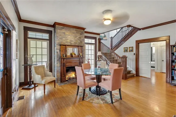 a view of a livingroom with furniture and a fireplace